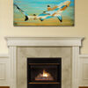 Shark art over fireplace